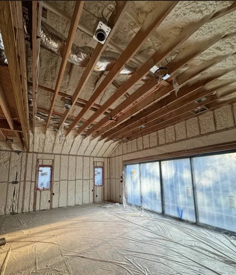 Interior walls and ceiling insulated with spray foam during new construction in Avon Park
